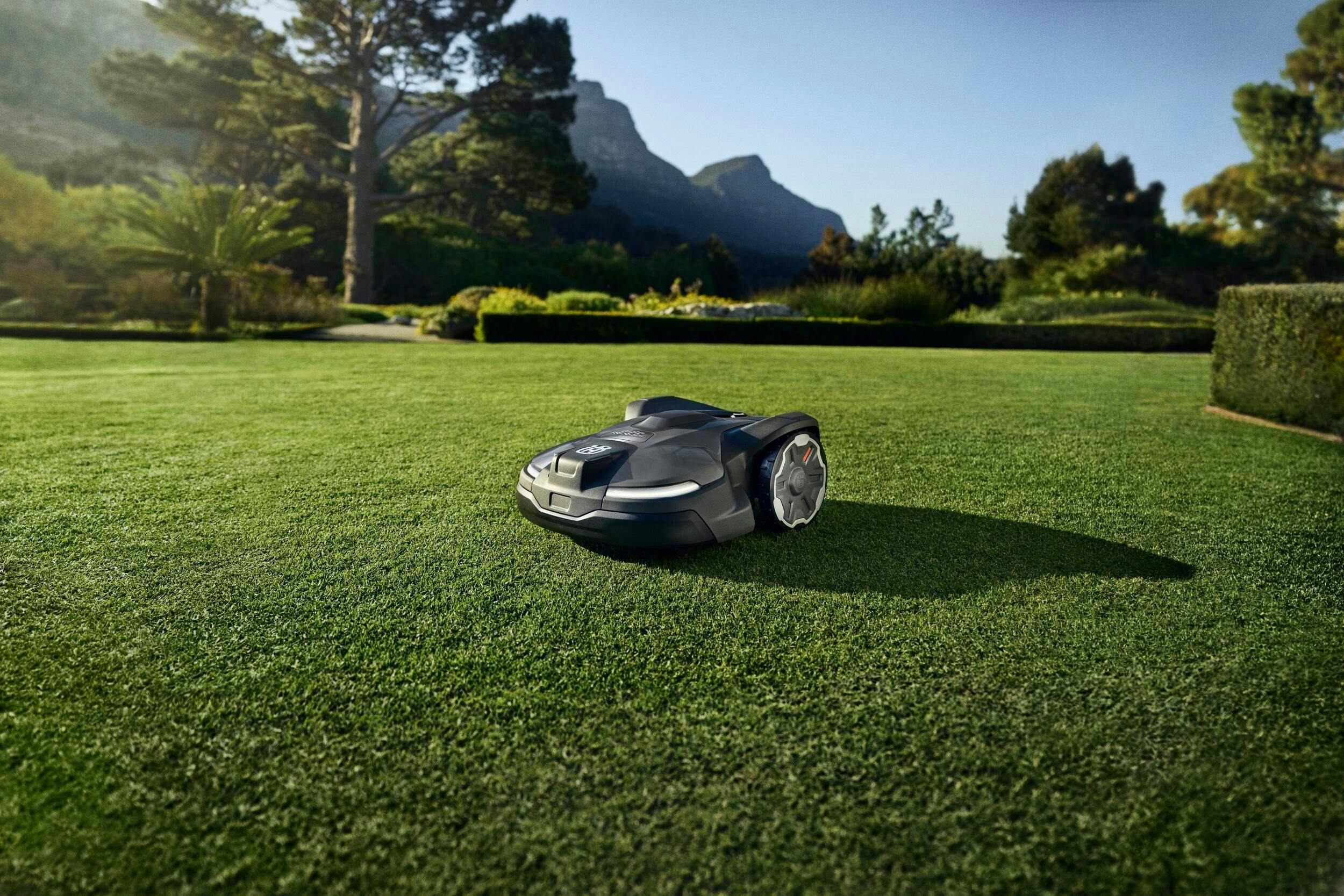 automower on bright green grass