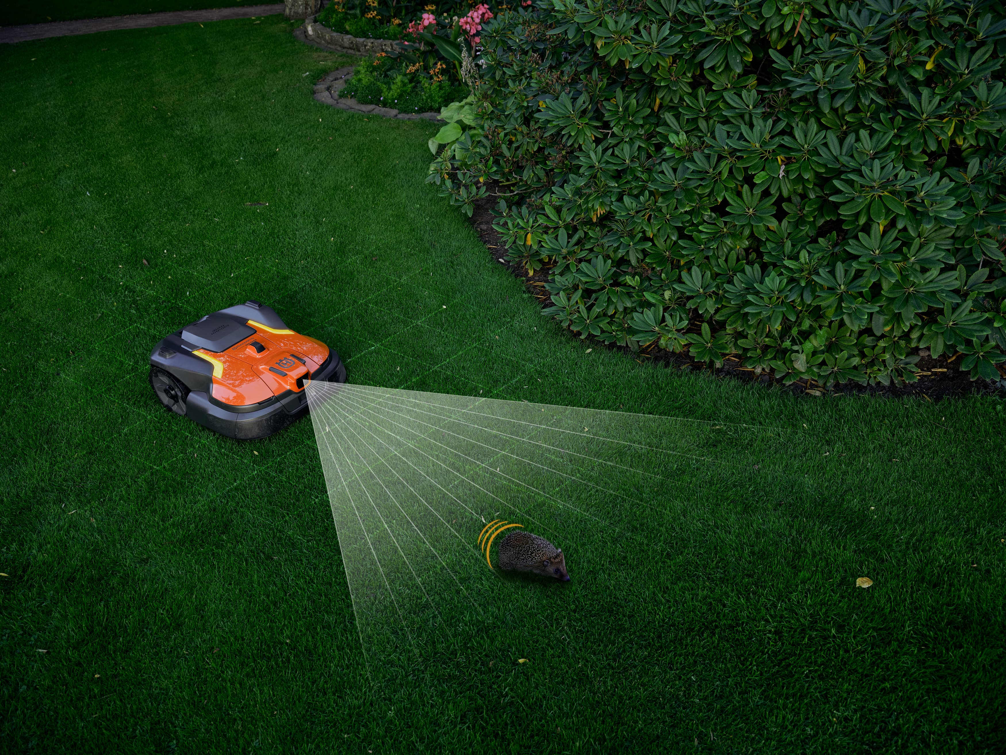 The AI-assisted vision technology enables the robotic lawnmower to detect, classify, and avoid obstacles on the turf. The system operates in both daylight and night-time conditions using infrared illumination. Object classification, including animals, balls, clothing, and standing water, supports effective obstacle avoidance while maintaining mowing efficiency.
Assembly of the accessory is to be performed by an authorised Husqvarna dealer. image